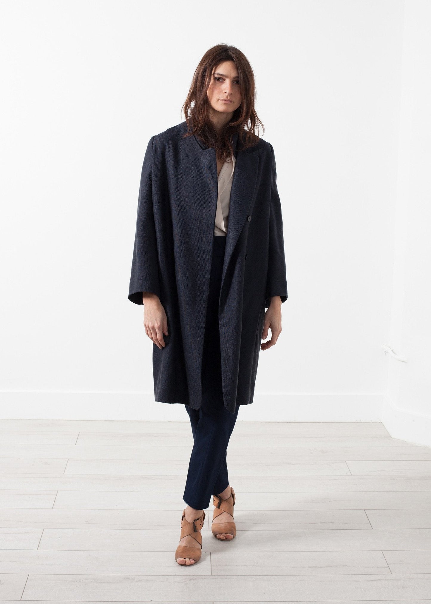 Manteau tissé à dos plissé