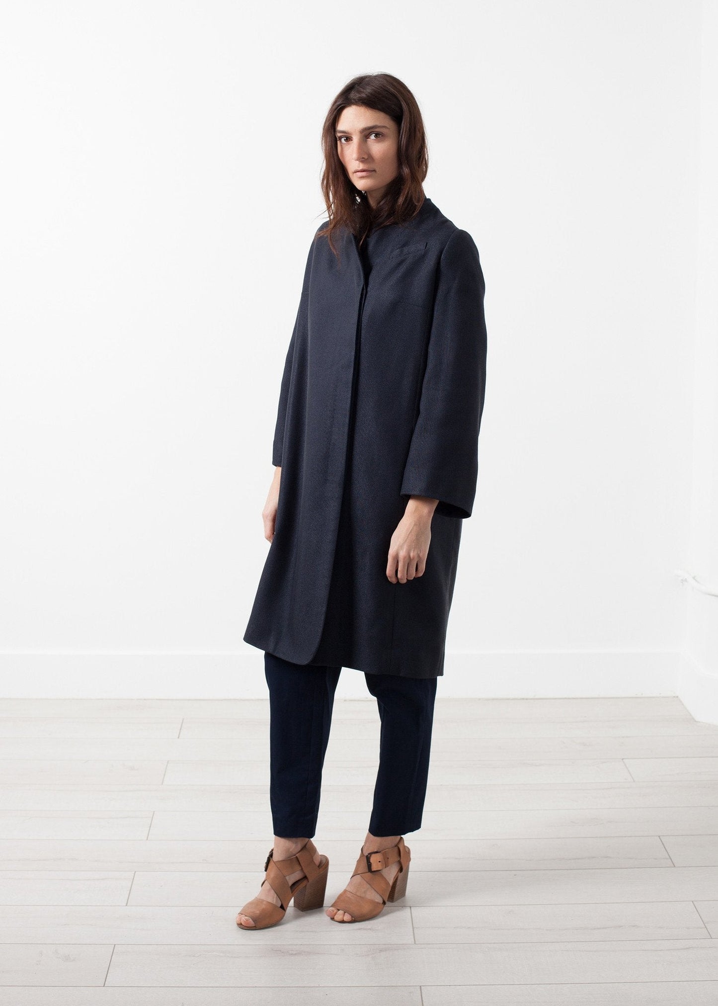 Manteau tissé à dos plissé